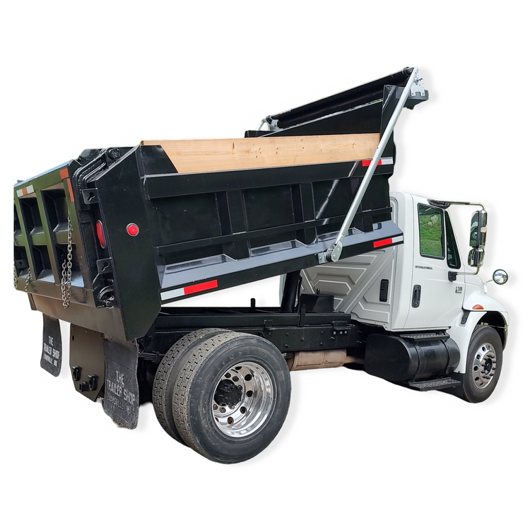 Patriot aluminum electric tarping system mounted on a small dump truck with its bed lifted halfway up
