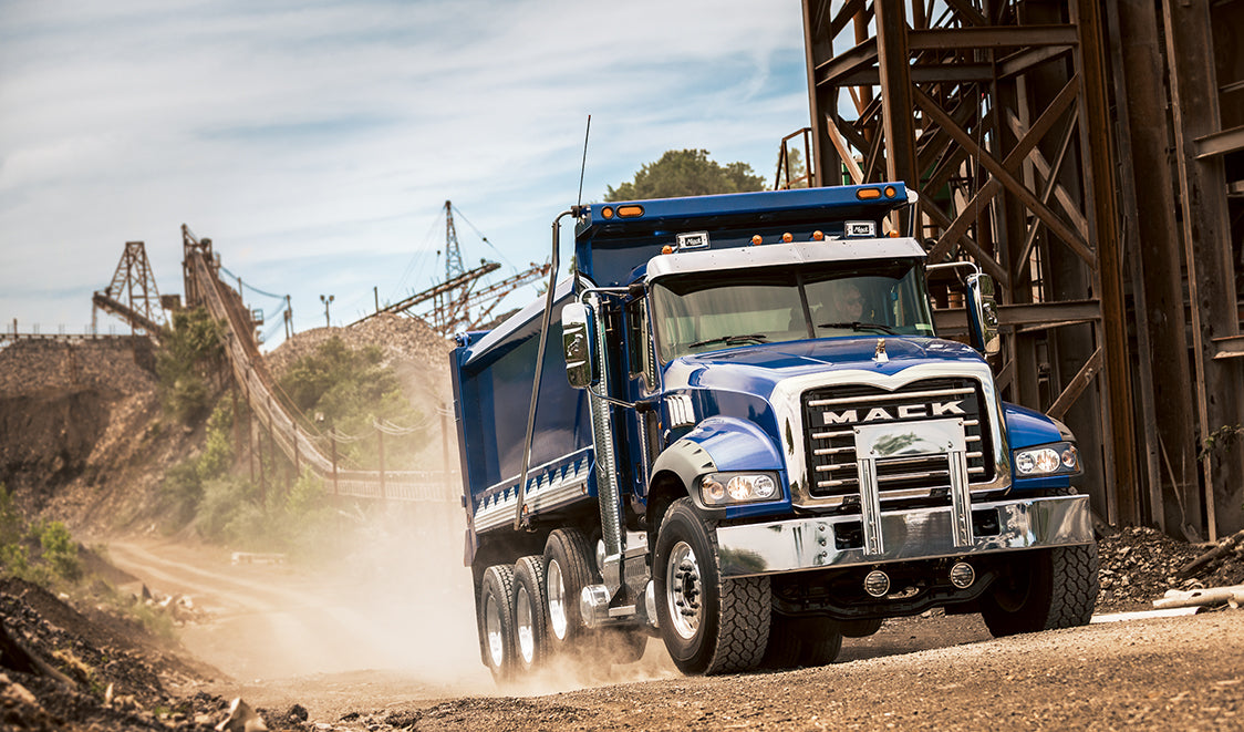 Blue dump truck with terminator premium aluminum electric tarp system