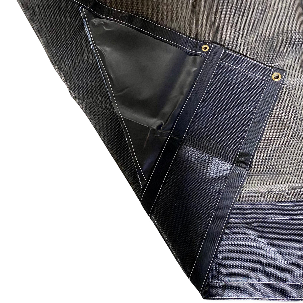 Black Mesh tarp close up of high quality lockstitch style stitching and vinyl reinforced corners and pocket.