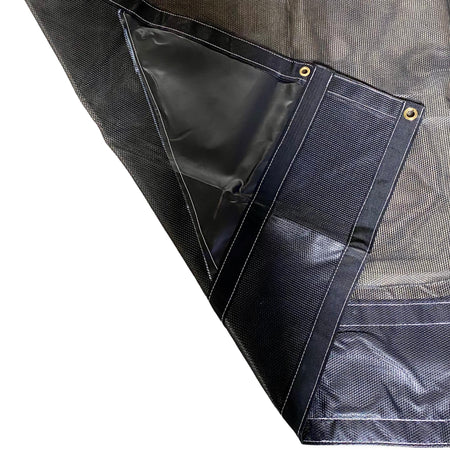 Black Mesh tarp close up of high quality lockstitch style stitching and vinyl reinforced corners and pocket.