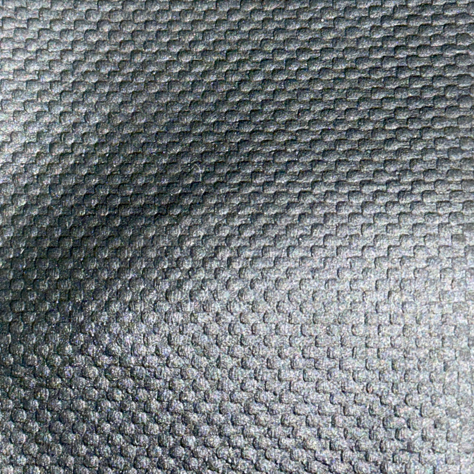 Close-up of textured gray fabric with a subtle pattern