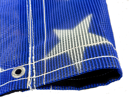 Blue American flag tarp displaying its white thread, grommets, and vinyl pocket reinforcement.