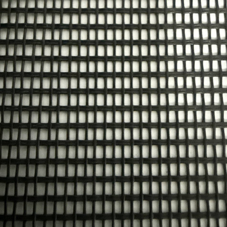 Close-up of a black mesh material sample