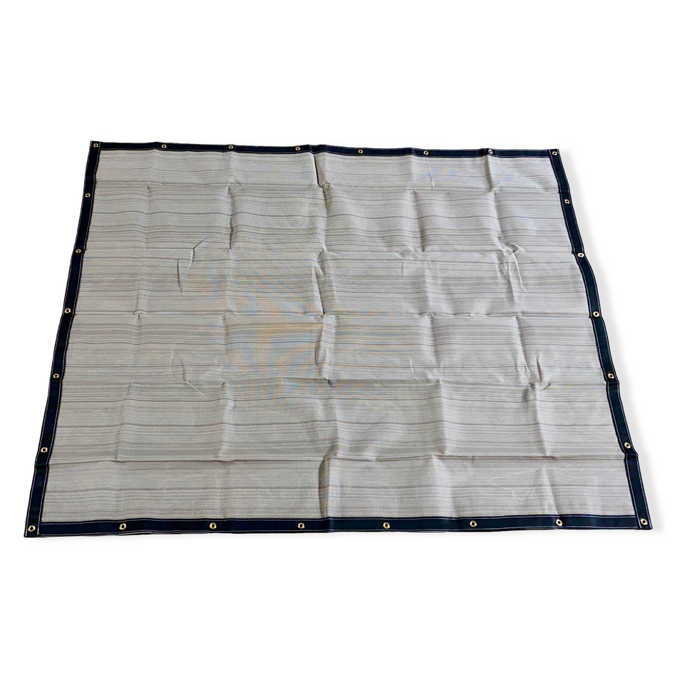 A beige hand tarp with stainless steel grommets on all four sides, designed for containing loads and protecting against the elements.