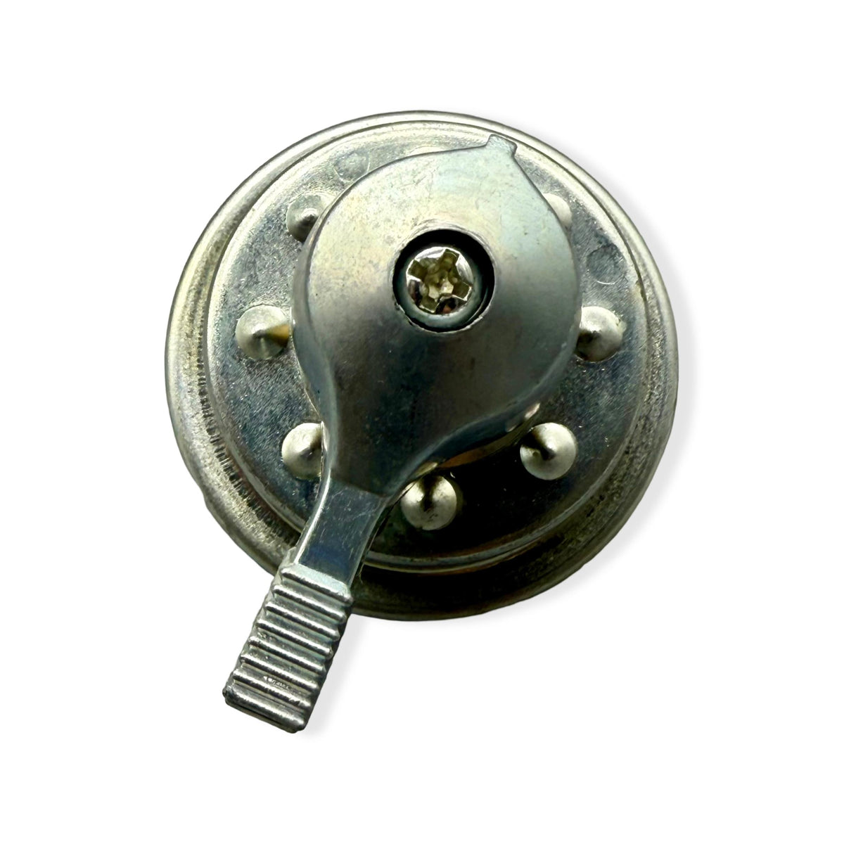 A silver rotary switch designed for use with electric tarping systems.